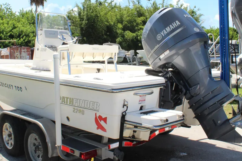 Slide: The Image of 2015 Pathfinder 2200 boat with Yamaha outboard motor on trailer. - 2