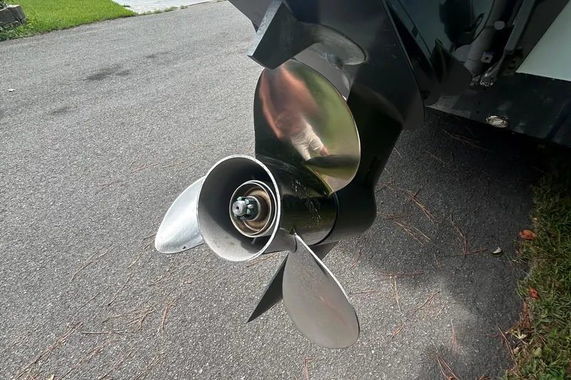 Slide: The Image of Close-up of a Southern Skimmer 19SS 2010 boat propeller on pavement. - 3