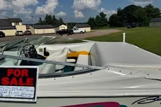 Slide: The Image of 1996 Baja 188 Islander 25th Anniversary boat for sale, parked outdoors under a clear sky. - 9