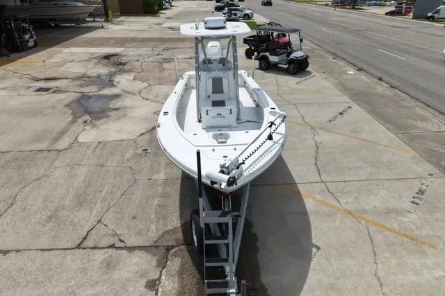 Slide: The Image of 2021 BlackJack 256 Bay boat on trailer in parking lot, aerial view. - 4
