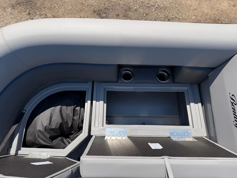 Slide: The Image of 2025 Bentley Pontoons Bolt 223 interior storage compartments and seating detail. - 15