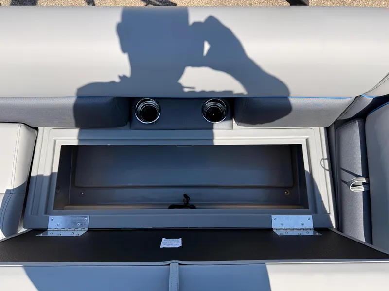 Slide: The Image of 2025 Bentley Pontoons Bolt 223 storage compartment with cup holders and seating. - 21