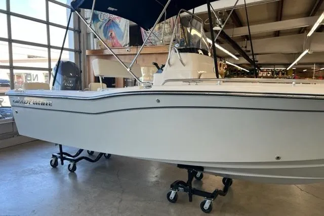 The Image of 2023 Grady White Fisherman 180 boat displayed indoors on wheeled supports. - 0
