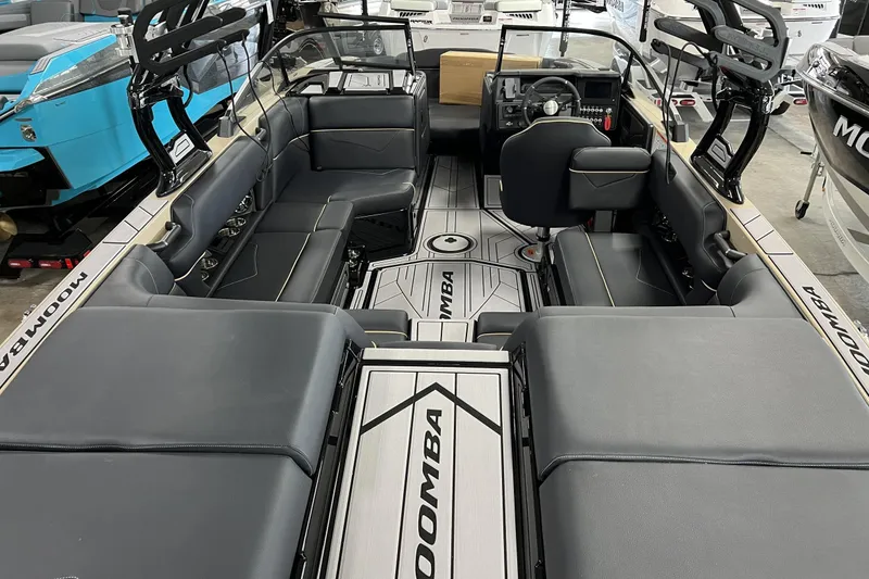 Slide: The Image of 2023 Moomba Kaiyen boat interior with sleek seating and modern dashboard design. - 3