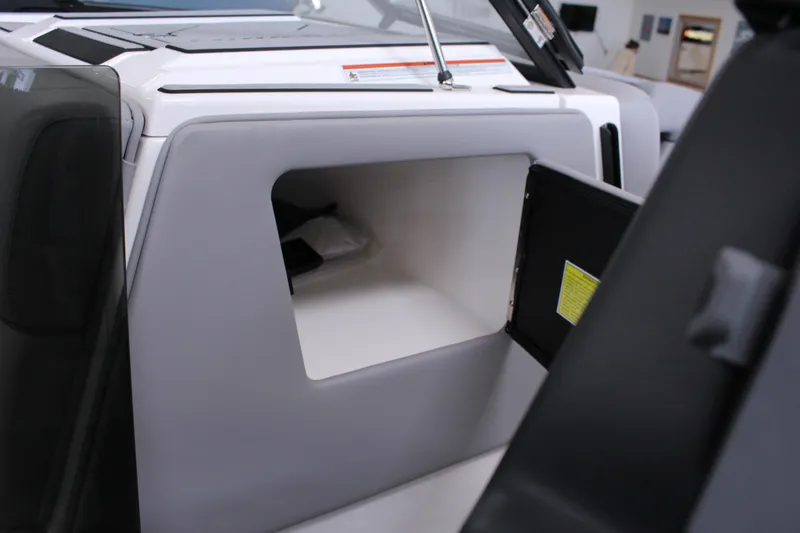 Slide: The Image of 2023 Moomba Makai boat interior storage compartment with open door. - 20