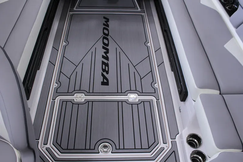Slide: The Image of 2023 Moomba Makai boat interior with sleek, modern flooring design. - 23