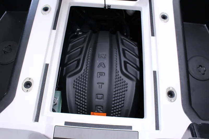 Slide: The Image of 2023 Moomba Makai boat engine compartment with Raptor branding. - 26