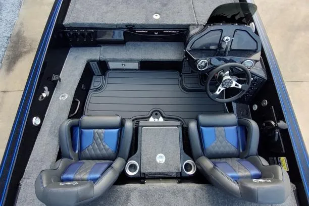 Slide: The Image of 2026 Phoenix 920 Elite X boat interior with dual seats and steering console. - 11