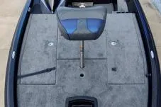 Slide: The Image of Phoenix 920 Elite X 2026 boat deck with seat, featuring gray carpeting and storage compartments. - 4