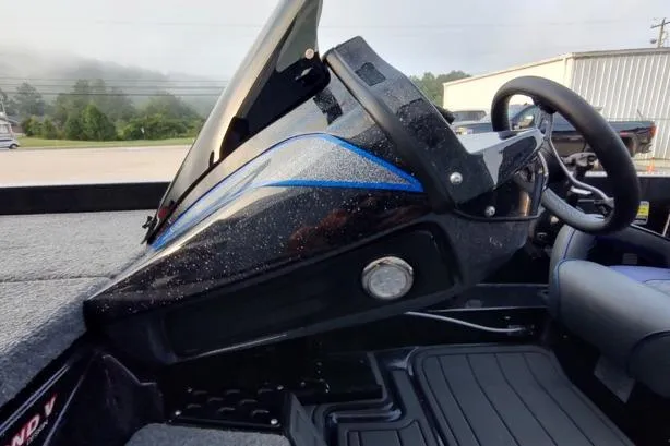 Slide: The Image of Interior view of a 2026 Phoenix 920 Elite X boat, featuring sleek dashboard design. - 7