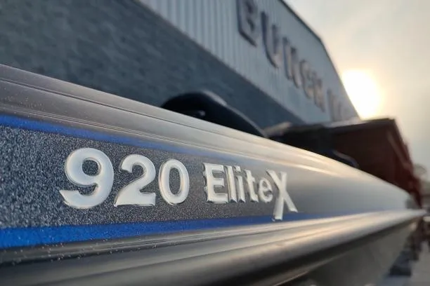Slide: The Image of Close-up of 2026 Phoenix 920 Elite X boat model name on hull. - 9