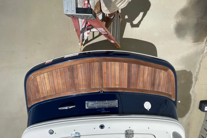 Slide: The Image of 2008 Chris-Craft Launch 25 boat with wooden deck, viewed from above. - 12