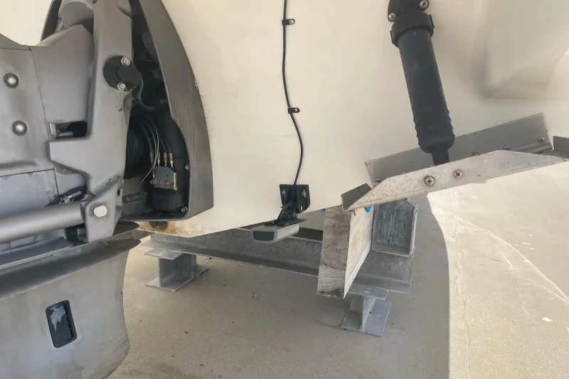 Slide: The Image of 2008 Chris-Craft Launch 25 boat engine and trim tab detail. - 29