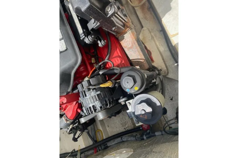 Slide: The Image of 2008 Chris-Craft Launch 25 engine compartment, showcasing mechanical components and details. - 39