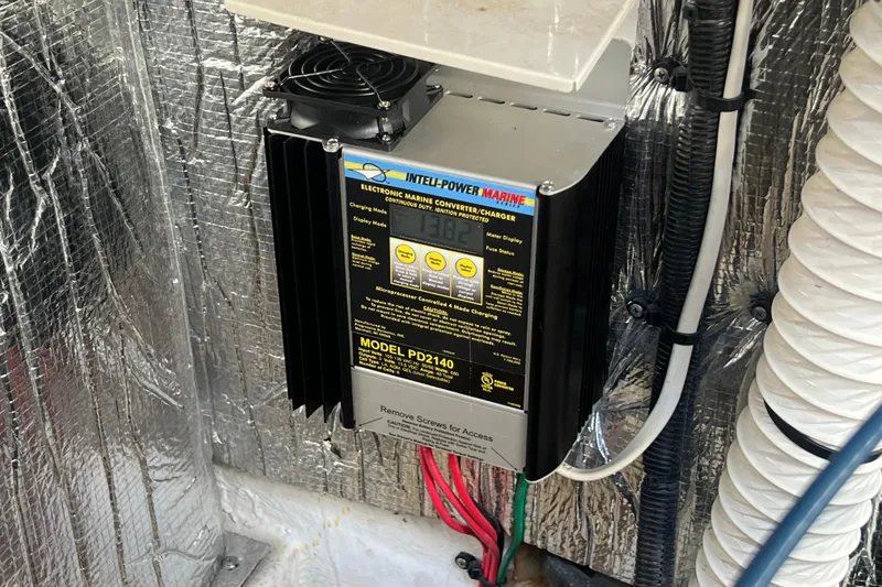 Slide: The Image of Electronic marine converter charger in 2001 Cruisers Yachts 3672 Express engine room. - 37