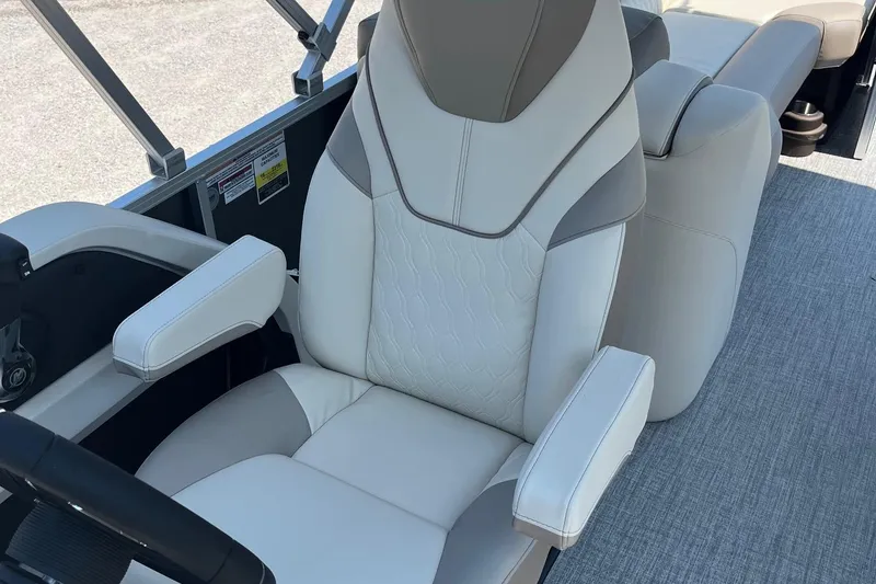 Slide: The Image of Luxurious seating in 2026 Avalon 25 LSZ Quad Lounger boat, featuring elegant design and comfort. - 4