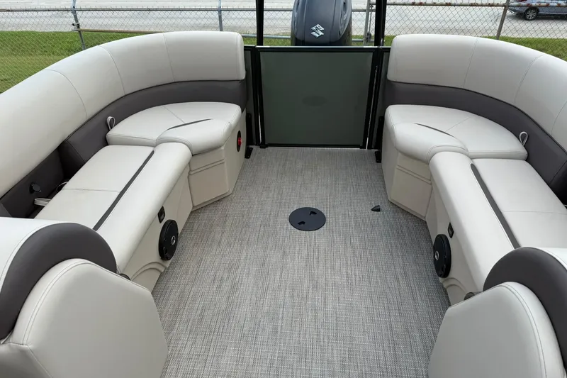 Slide: The Image of 2026 Bentley Pontoons Legacy 243 Navigator interior with plush seating and modern design. - 10