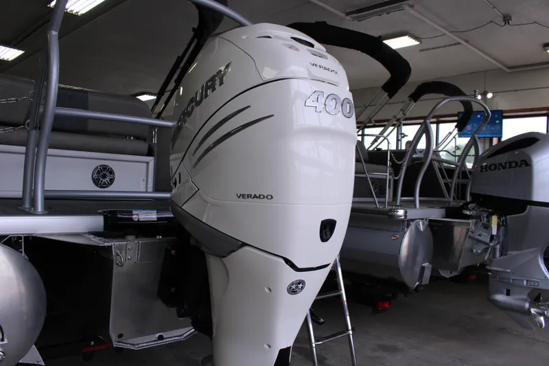 Slide: The Image of 2023 Premier 250 Intrigue boat with Mercury Verado 400 outboard engine in showroom. - 11