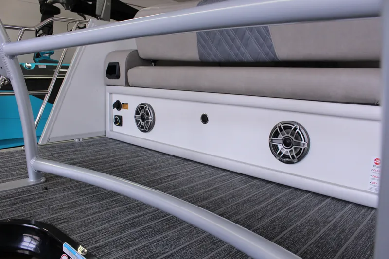 Slide: The Image of Interior of 2023 Premier 250 Intrigue boat with speakers and seating. - 14