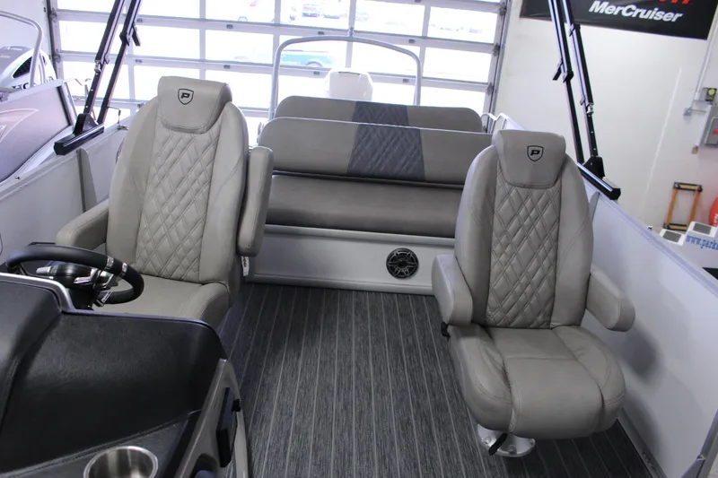 Slide: The Image of Interior of 2023 Premier 250 Intrigue boat with luxurious seating and modern design. - 22