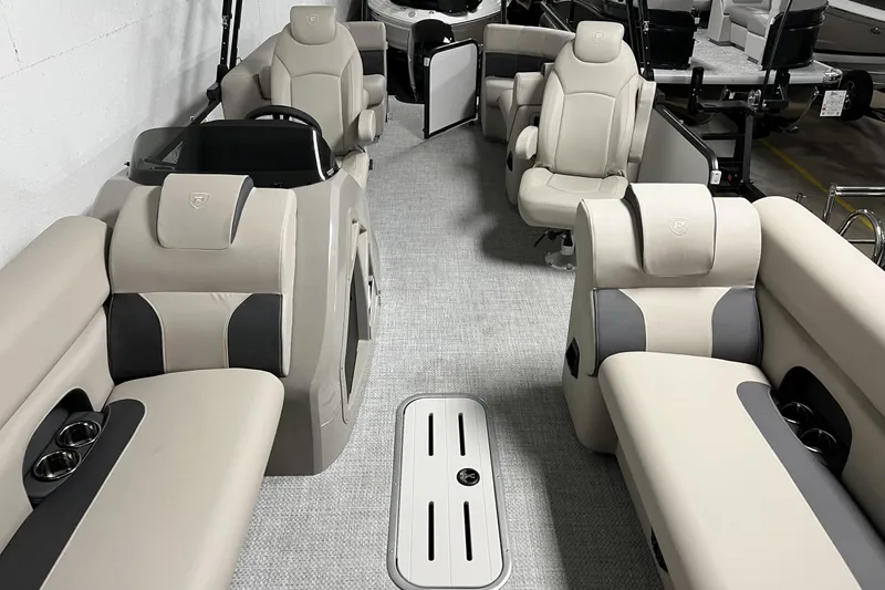 Slide: The Image of 2023 Premier 250 Intrigue boat interior with luxurious seating and modern design. - 27