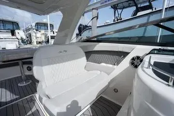 Slide: The Image of 2023 Sea Ray SLX 350 Outboard interior with luxurious seating and modern design. - 17