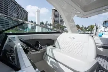 Slide: The Image of 2023 Sea Ray SLX 350 Outboard interior with luxurious seating and modern design. - 19
