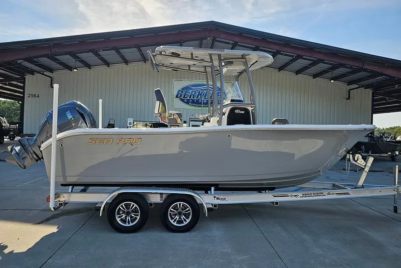The Image of 2025 Sea Pro 222 Center Console boat on trailer at dealership. - 1
