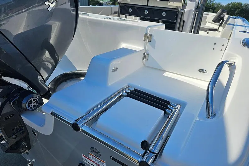 Slide: The Image of 2025 Sea Pro 222 Center Console boat with Yamaha engine and swim ladder. - 11