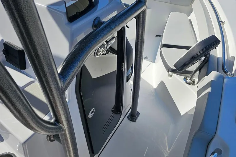 Slide: The Image of 2025 Sea Pro 222 Center Console boat interior with seating and console details. - 25