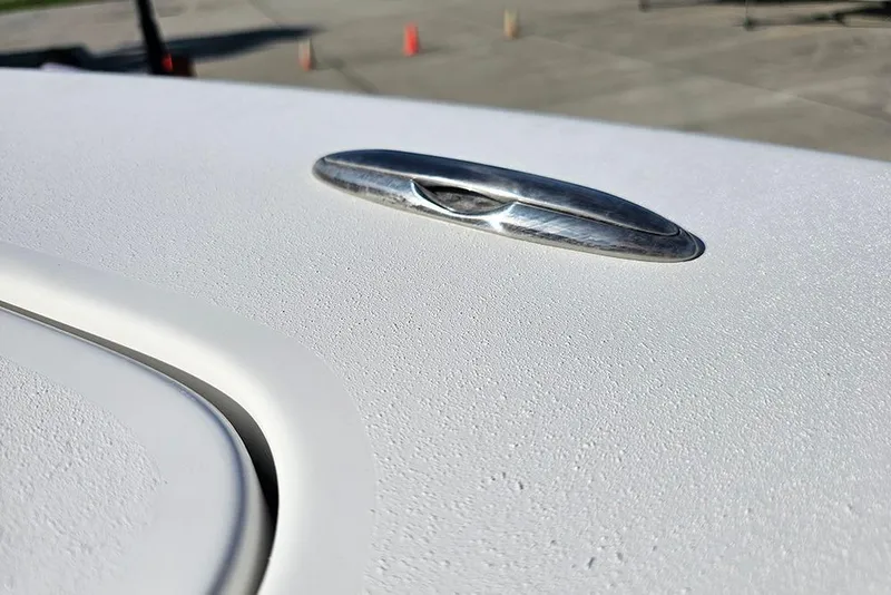 Slide: The Image of Close-up of 2025 Sea Pro 222 Center Console boat's sleek metallic cleat on deck. - 31
