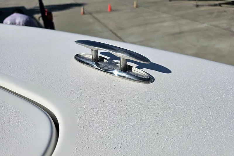 Slide: The Image of 2025 Sea Pro 222 Center Console boat cleat on deck in sunlight. - 32