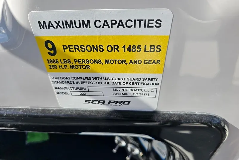 Slide: The Image of 2025 Sea Pro 222 Center Console capacity label, 9 persons or 1485 lbs, 250 HP motor. - 36