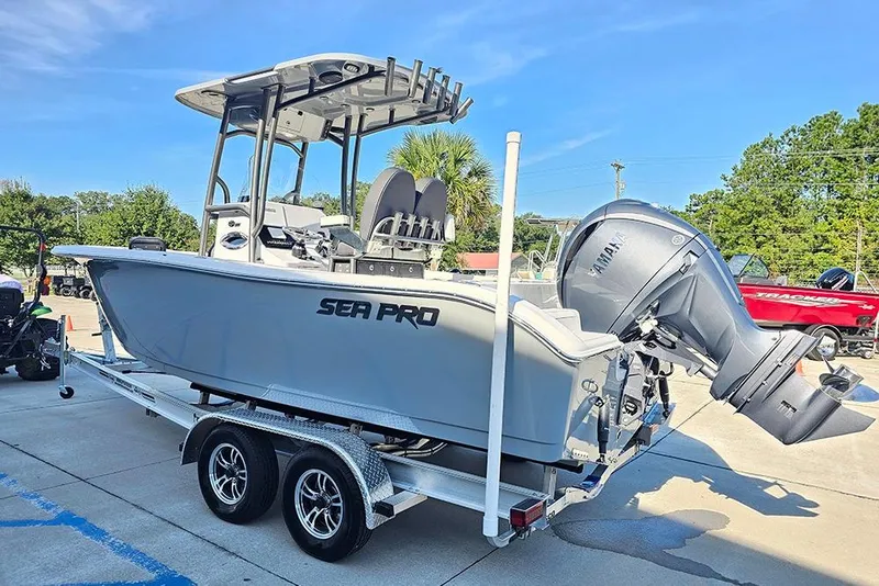 Slide: The Image of 2025 Sea Pro 222 Center Console boat on trailer, featuring Yamaha outboard motor. - 7
