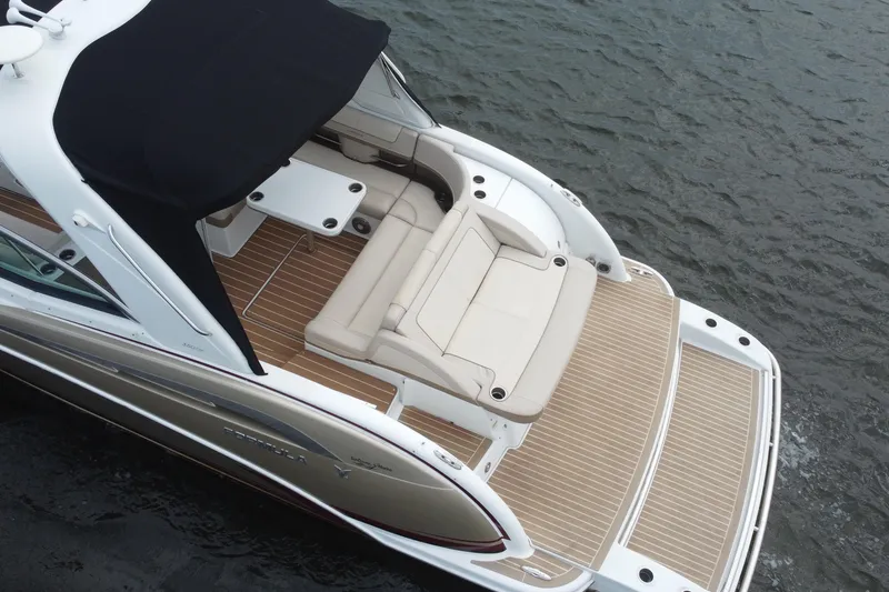 Slide: The Image of 2013 Formula 350 CBR boat with spacious deck and seating on water. - 10