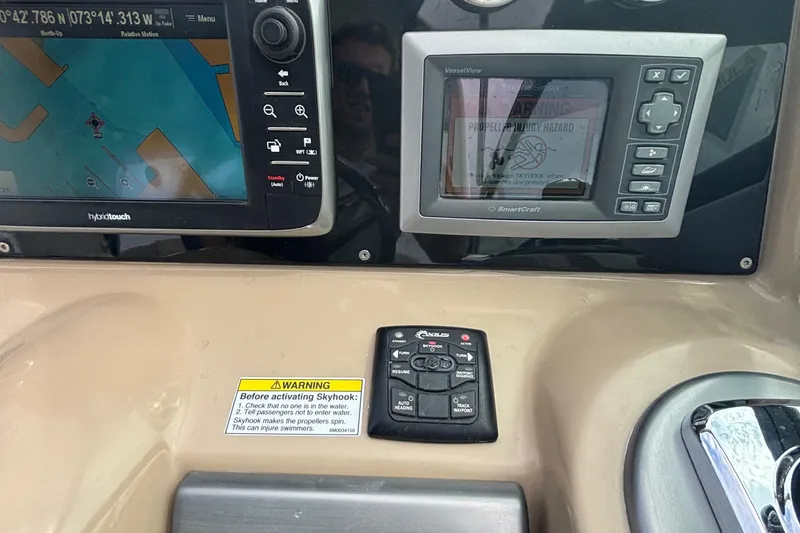 Slide: The Image of Dashboard of a 2013 Formula 350 CBR boat with navigation and control systems. - 27