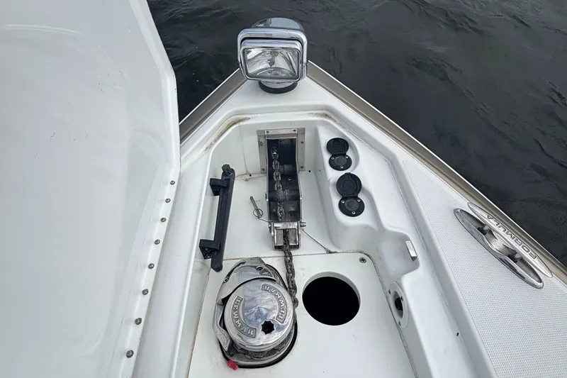 Slide: The Image of 2013 Formula 350 CBR boat anchor compartment with winch and controls. - 36