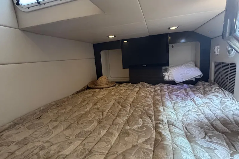 Slide: The Image of Cozy cabin interior of 2013 Formula 350 CBR with bed, TV, and window. - 42