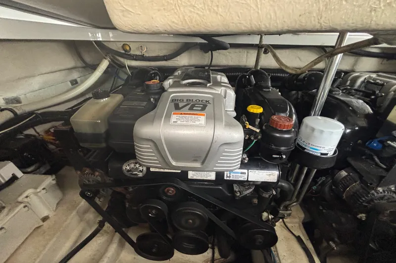 Slide: The Image of Engine compartment of a 2013 Formula 350 CBR boat, featuring a Big Block V8 engine. - 45