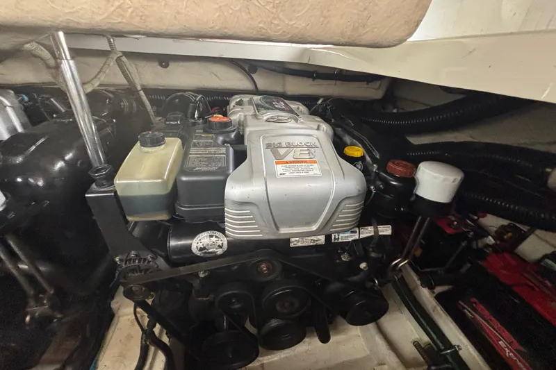 Slide: The Image of Engine compartment of a 2013 Formula 350 CBR boat, featuring a V8 engine. - 46