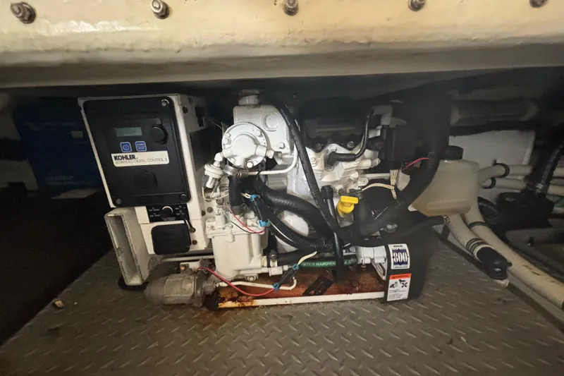 Slide: The Image of Engine compartment of a 2013 Formula 350 CBR boat with Kohler generator. - 47