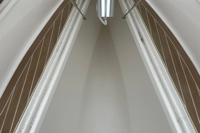 Slide: The Image of Interior view of 2016 Buddy Davis 28 Center Console boat, showcasing sleek design elements. - 18