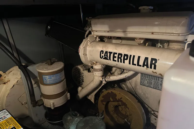 Slide: The Image of Engine room of 1999 Silverton 442 Cockpit Motor Yacht with Caterpillar engine. - 4