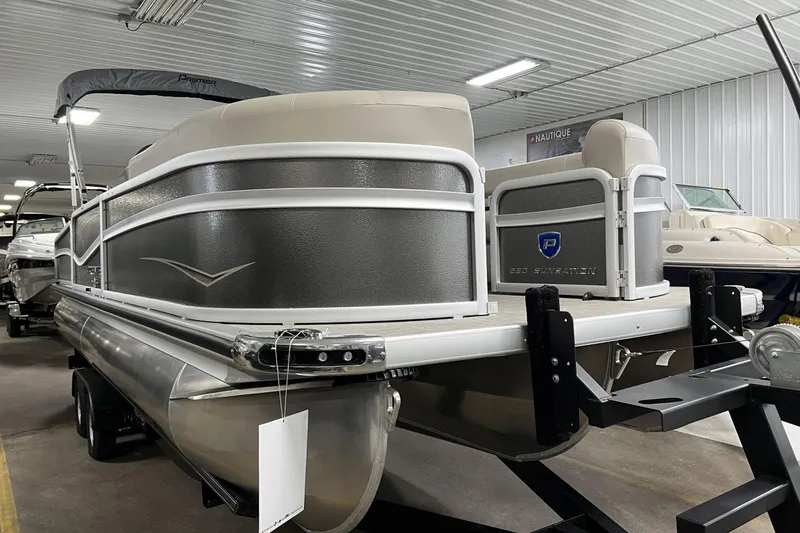 The Image of 2023 Premier Sunsation Angler 230 pontoon boat in showroom, side view. - 1
