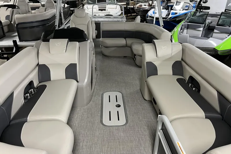 Slide: The Image of 2023 Premier Sunsation Angler 230 interior with luxurious seating and modern design. - 2