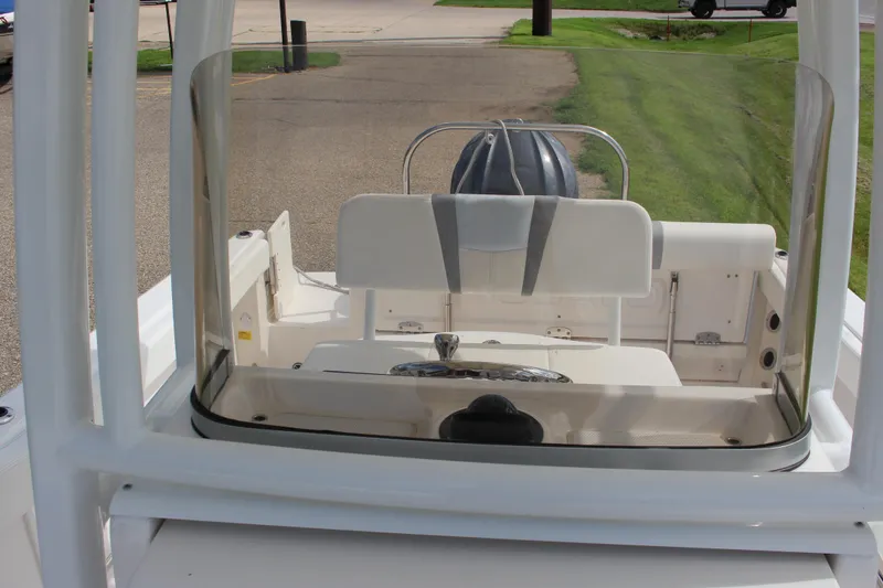 Slide: The Image of 2023 Robalo R222 Center Console boat interior with seating and steering wheel. - 6