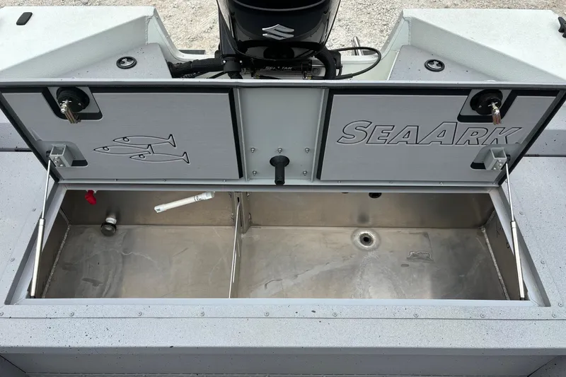 Slide: The Image of 2026 SeaArk ProCat 240 boat livewell with dual compartments and secure latches. - 7