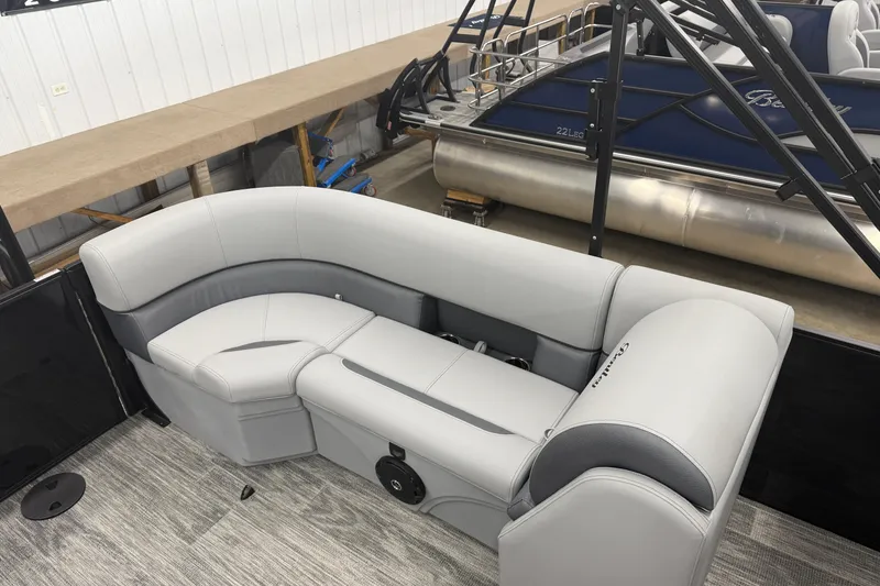 Slide: The Image of 2026 Bentley Pontoons Legacy 243 Navigator interior with luxurious gray seating. - 17