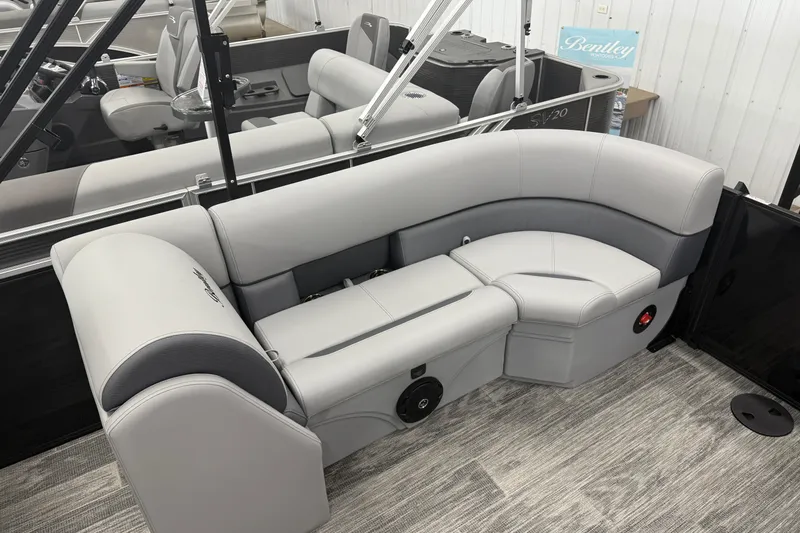 Slide: The Image of 2026 Bentley Pontoons Legacy 243 Navigator interior with sleek gray seating. - 18