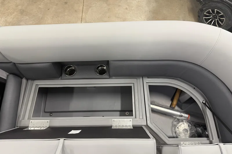 Slide: The Image of 2026 Bentley Pontoons Legacy 243 Navigator interior storage compartment. - 23